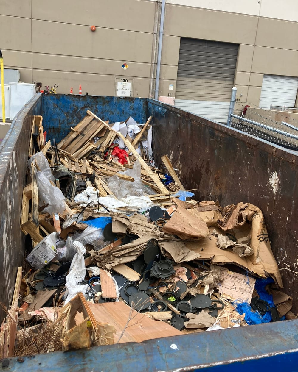 The same construction container after compaction.