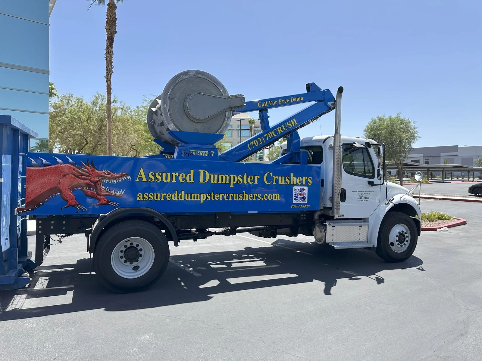 The Assured Dumpster Crushers truck.